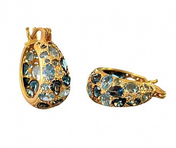 Work: Aquamarine and London Blue Topaz Hoops $3,300